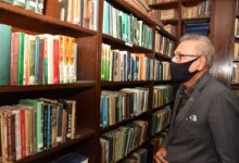 Photo of President Alvi for digitalization of rare manuscripts at Quaid e Azam Academy