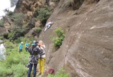 Photo of Skilled Climbers instruct Swat Females in Using Maps and Compass
