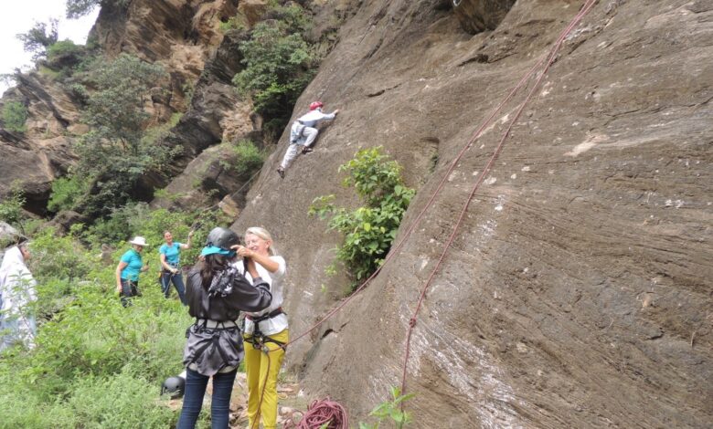 Skilled climbers instruct Swat Females in Using Maps and Compass